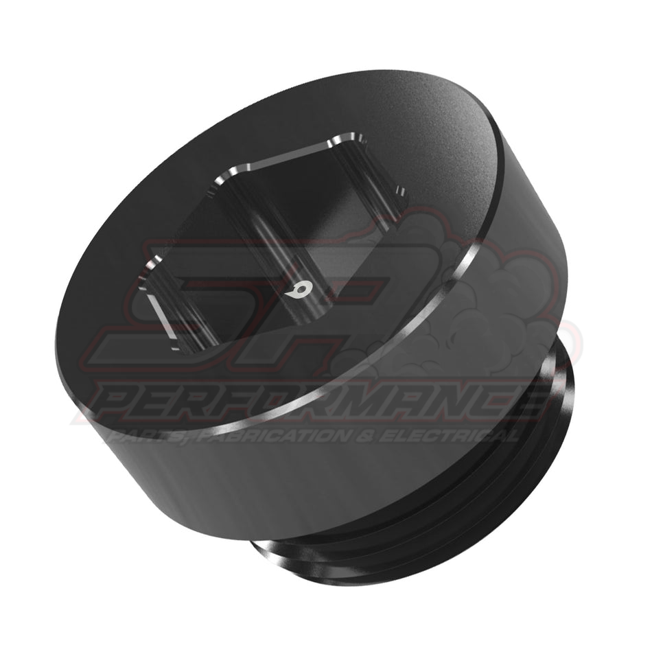 Angled top view of black anodised aluminium BEVINSEE differential drain plug 33117525064 showing hexagonal socket and threaded body with O-ring groove