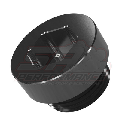 Angled top view of black anodised aluminium BEVINSEE differential drain plug 33117525064 showing hexagonal socket and threaded body with O-ring groove