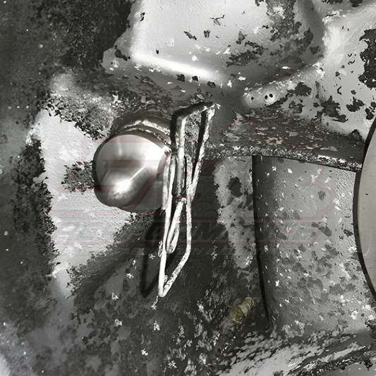 Close-up of BEVINSEE stainless steel clutch pivot pin installed in BMW E36 E46 E90 E39 E60 F10 F30 clutch fork mechanism showing metallic finish and OEM fitment