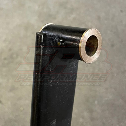 Angled view of BEVINSEE bronze clutch brake pedal bushing for BMW E36 E46 Z3 Z4 showing black powder-coated exterior and bronze inner bore
