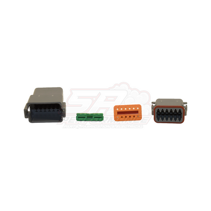 Four Deutsch DT 12 pin connector housings shown side by side — grey male and female housings with orange and green terminals visible in cavities