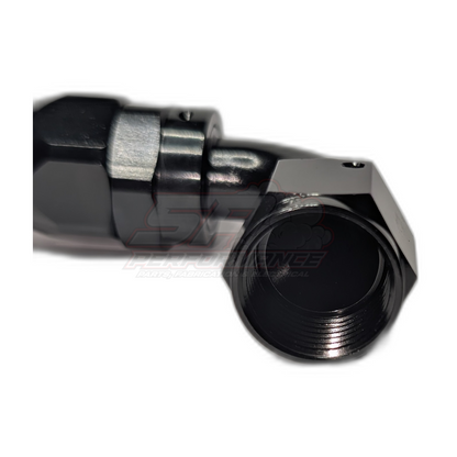 Black anodised aluminium AN10 90-degree hose end fitting close-up showing internal threads and hexagonal body detail