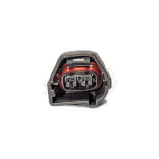 Front view of Toyota 1JZ-GTE 2JZ-GTE 2-pin cam crank sensor connector housing showing grey shell with red seal and metal terminals