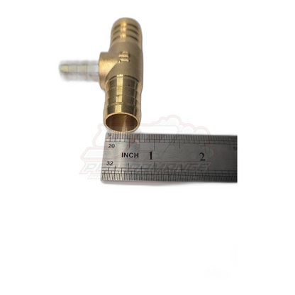 Brass 3-way T-piece hose joiner with ruler showing size, featuring two 3/4 inch barbed outlets and one 1/2 inch reducing branch with ribbed hose tails
