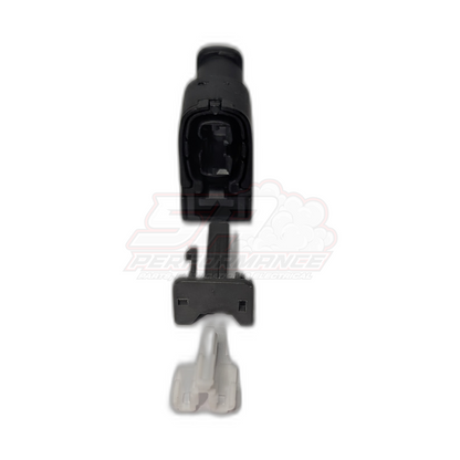 Exploded view of Toyota Denso 2 pin ignition coil connector showing black housing with internal terminals and grey wire seal