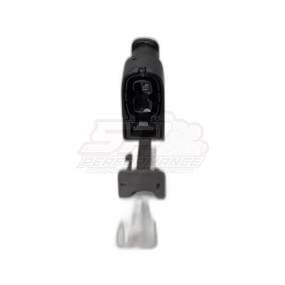 Front view of Toyota 2 pin Denso ignition coil connector housing showing black moulded body, internal terminal cavities and grey wire seal at base