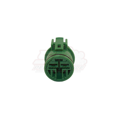 Front view of Denso 4-pin green round connector showing circular terminal layout with locking tabs for late model alternators