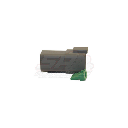Grey Deutsch DT04-6P 6-pin female housing angled view with green wedge lock attached at base