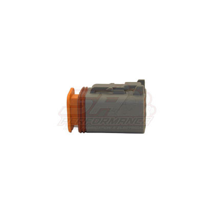 Side profile view of grey Deutsch DT06-6S 6-pin male housing with orange wedge lock and seal insert visible