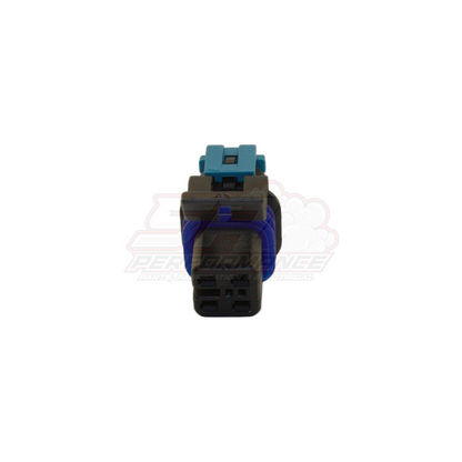 Rear view of 4-pin GM Holden Commodore fuel pump connector showing light blue locking tab, grey housing, blue seal and black terminal pins