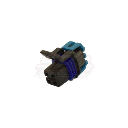 Angled view of GM Holden 4 pin fuel pump connector showing teal locking tab, blue seal, black housing and three socket terminals