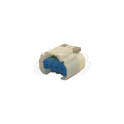 Angled view of GM 4-pin female connector housing in grey with blue locking tab and four terminal sockets for Holden fuel pump modules