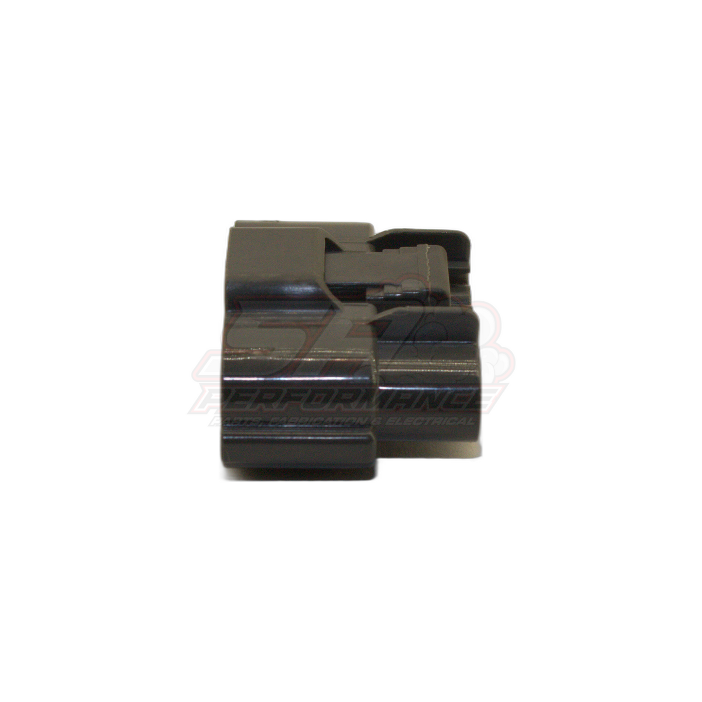 Side view of Nissan 6 pin grey igniter connector housing showing locking tab and terminal cavities