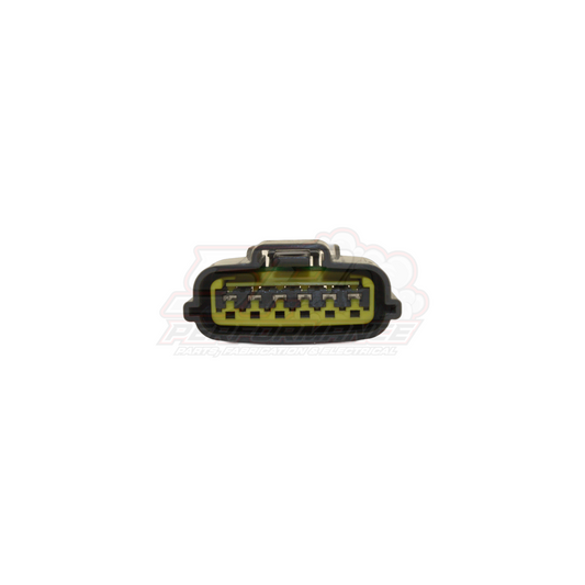 Front view of Nissan 6 pin grey igniter connector showing yellow housing with metal terminals and black locking tab