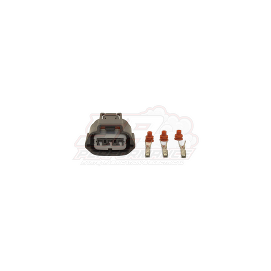 3-pin Nissan ignition coil and TPS connector kit showing grey housing with three cavities and three crimp terminals with orange seals