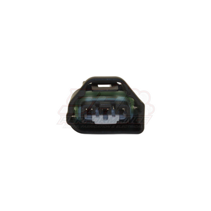 Front view of 3-pin Toyota Mazda TPS throttle position sensor connector showing black housing with green wire seal and three terminal pins